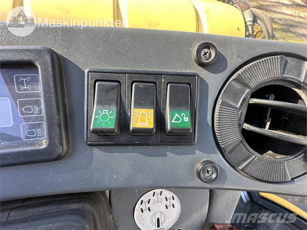 New Holland LB 115 Екскаватори-навантажувачі