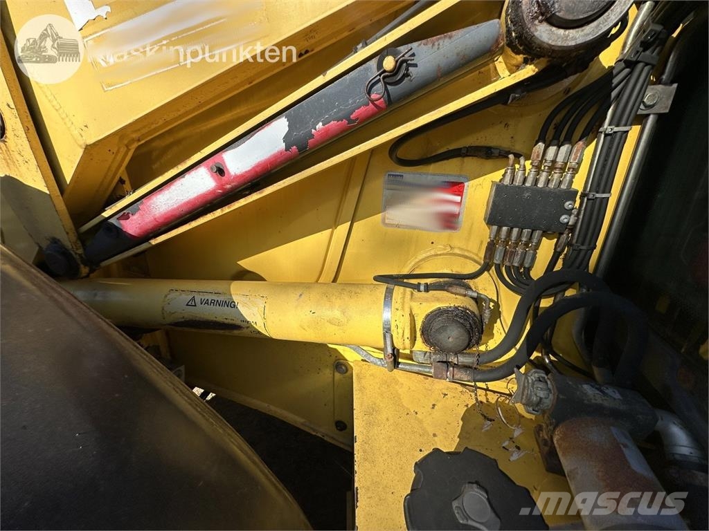 New Holland LB 115 Екскаватори-навантажувачі
