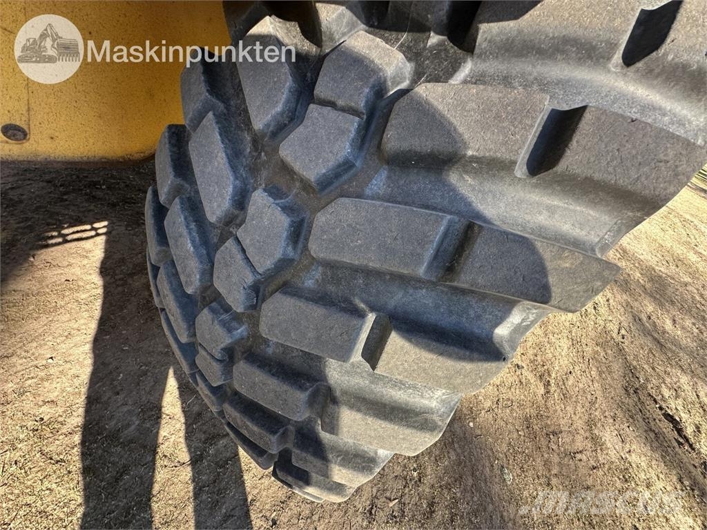 New Holland LB 115 Екскаватори-навантажувачі
