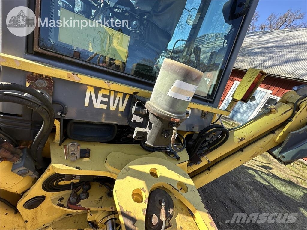 New Holland LB 115 Екскаватори-навантажувачі