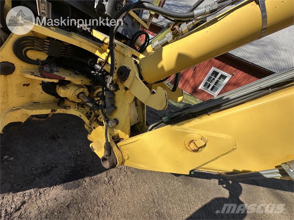 New Holland LB 115 Екскаватори-навантажувачі