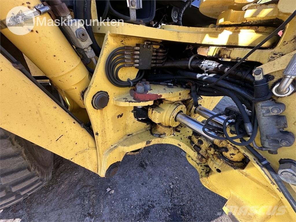 New Holland LB 115 Екскаватори-навантажувачі
