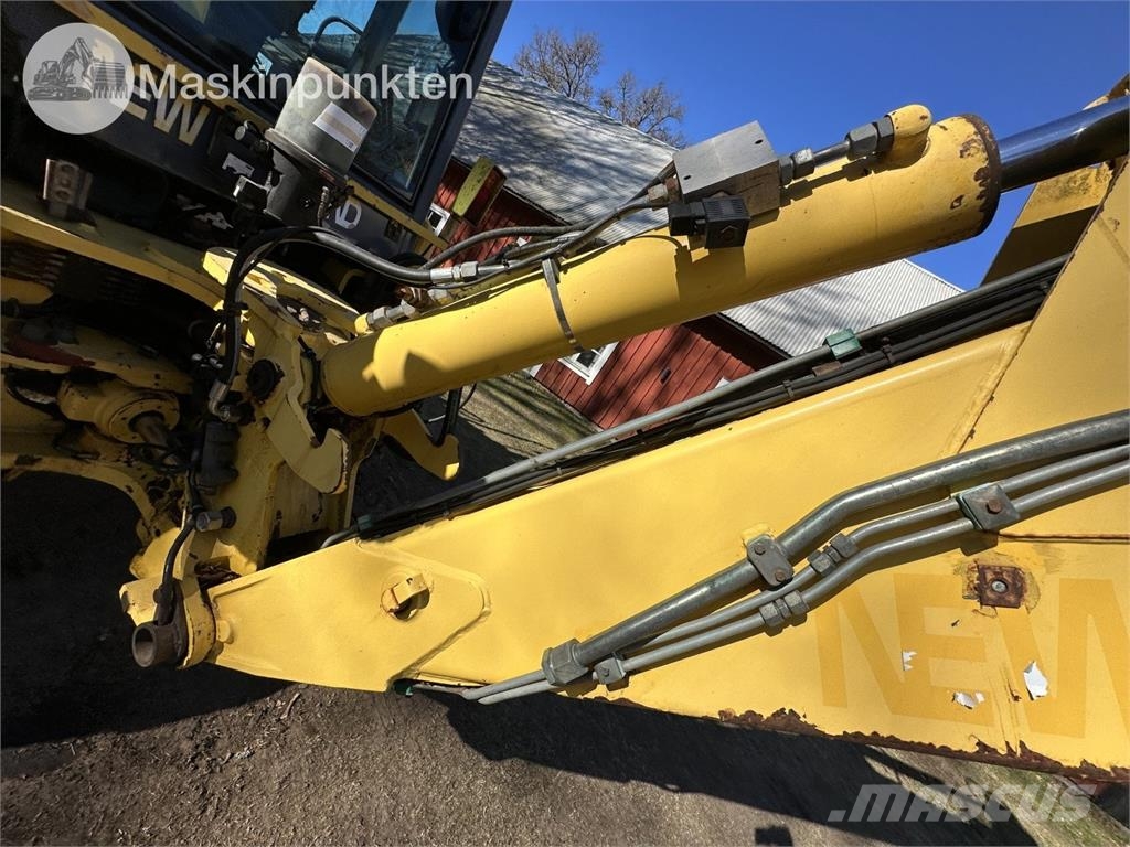 New Holland LB 115 Екскаватори-навантажувачі