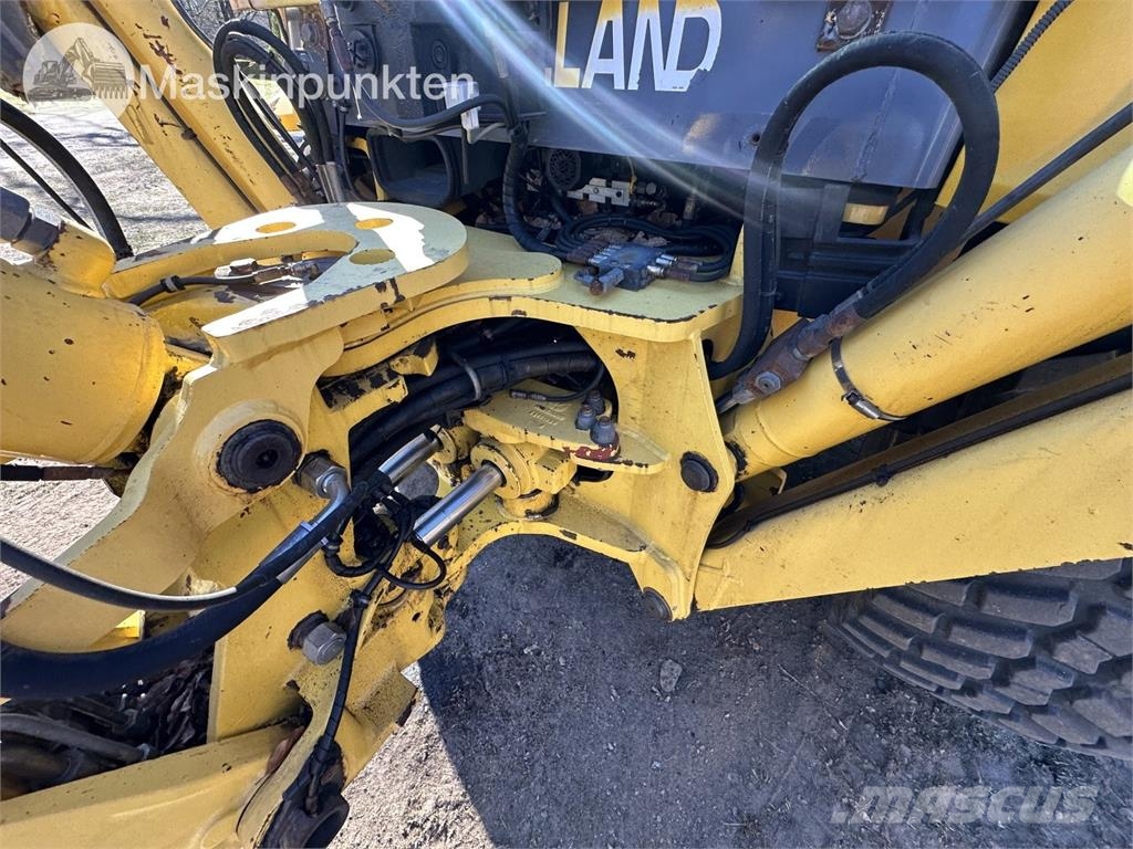 New Holland LB 115 Екскаватори-навантажувачі
