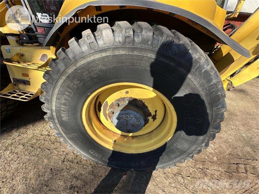 New Holland LB 115 Екскаватори-навантажувачі