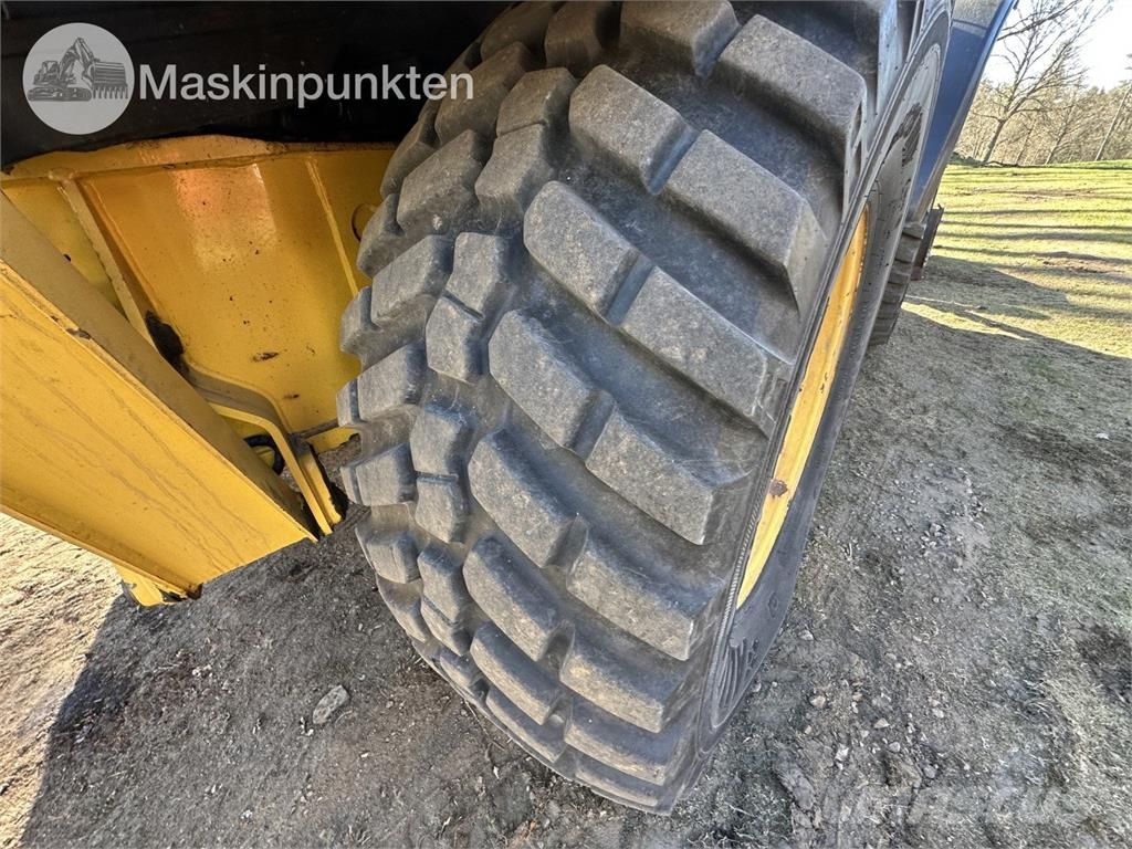 New Holland LB 115 Екскаватори-навантажувачі