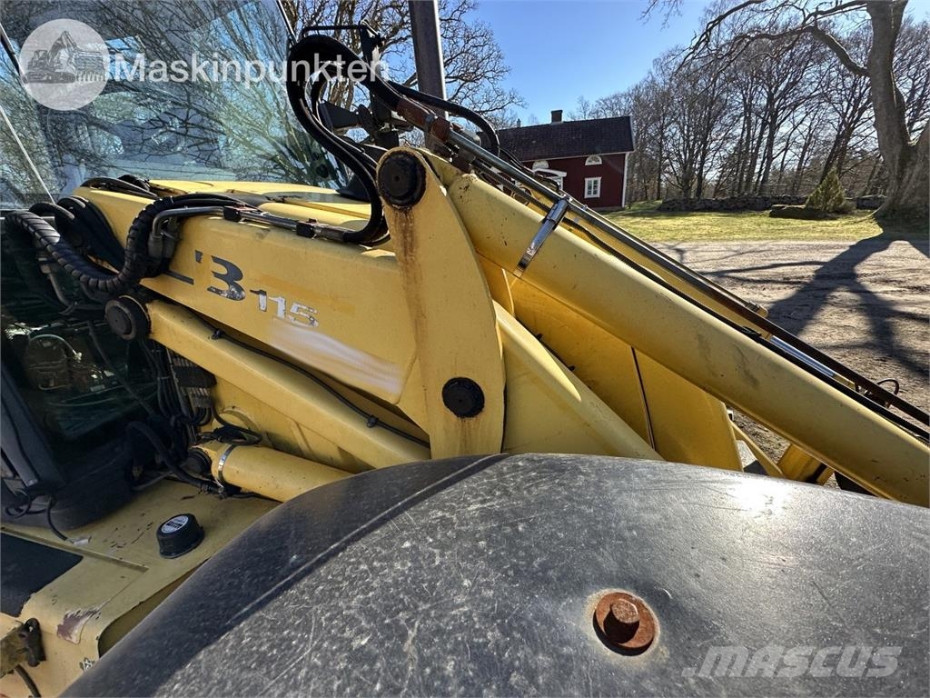 New Holland LB 115 Екскаватори-навантажувачі