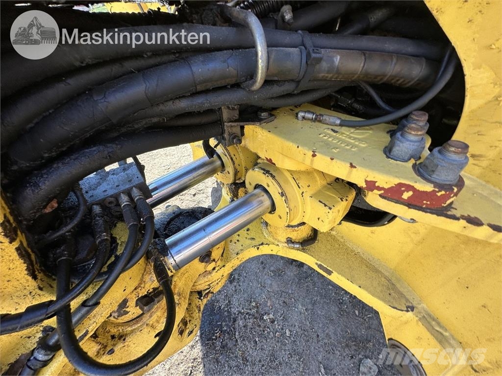 New Holland LB 115 Екскаватори-навантажувачі