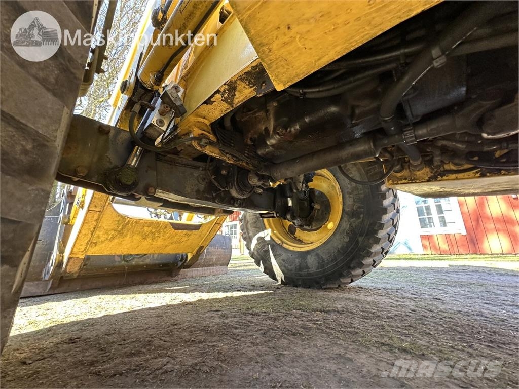 New Holland LB 115 Екскаватори-навантажувачі
