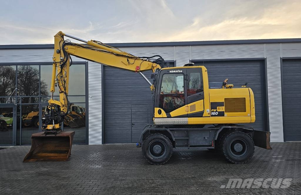 Komatsu PW 160-11 حفارات بعجل