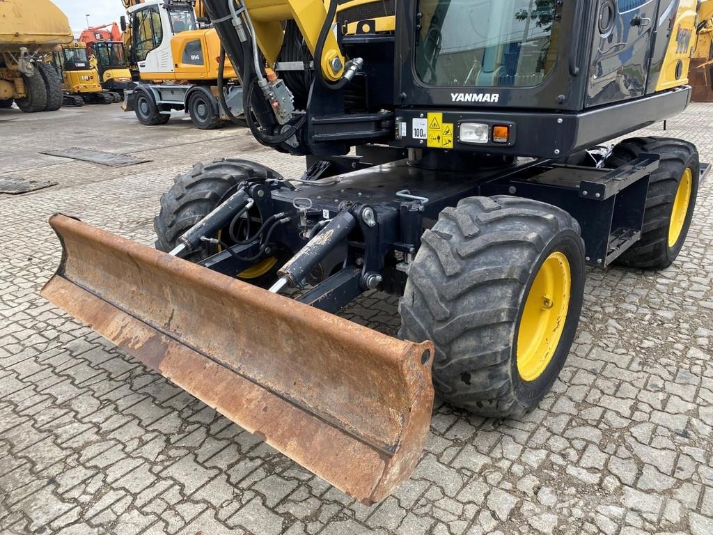 Yanmar B95w . Excavadoras de ruedas