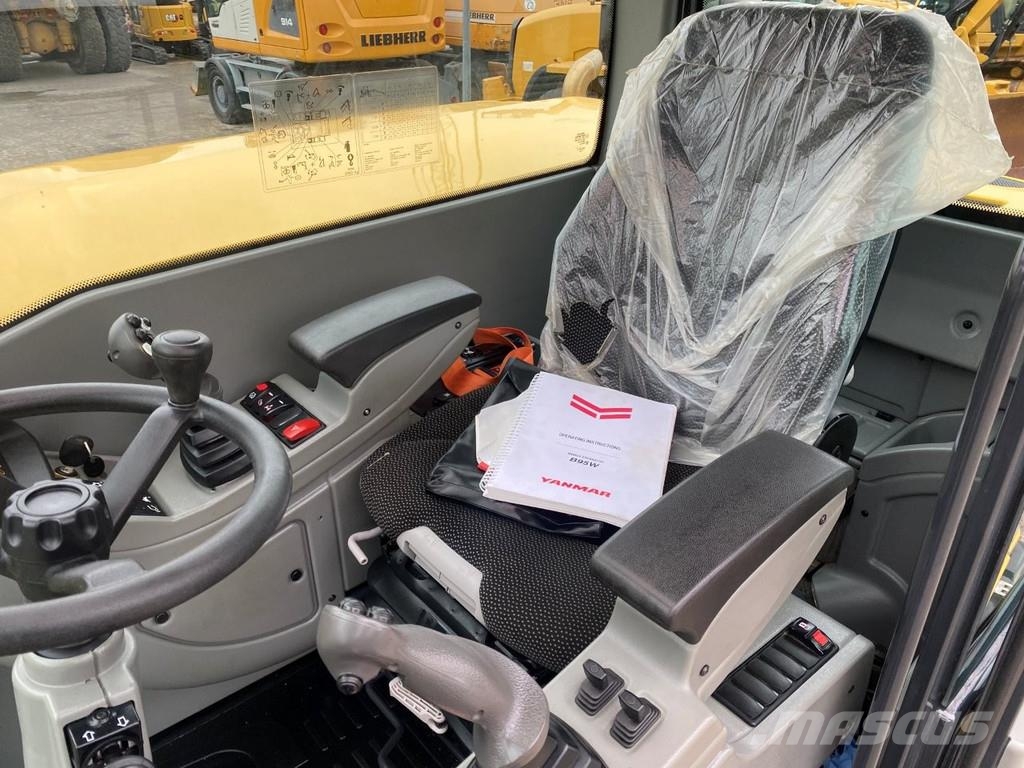 Yanmar B95w . Excavadoras de ruedas