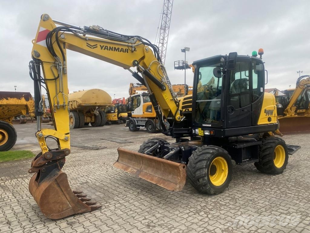 Yanmar B95w . Excavadoras de ruedas