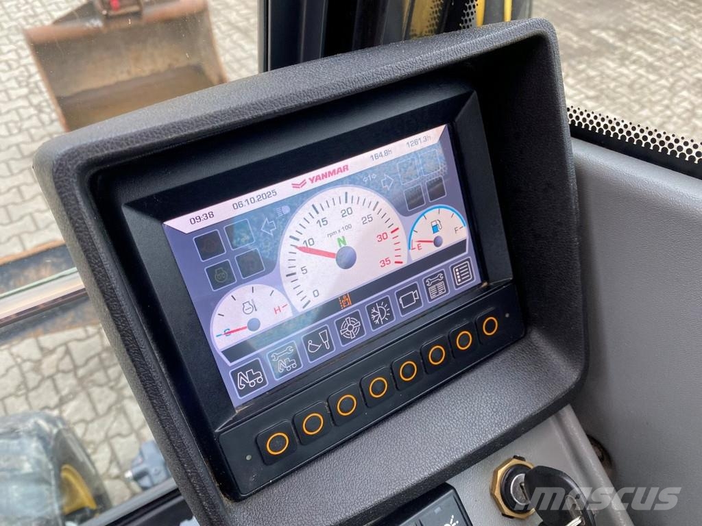 Yanmar B95w . Excavadoras de ruedas