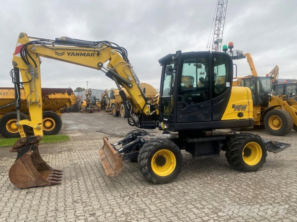 Yanmar B95w . Excavadoras de ruedas