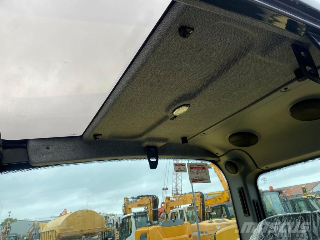 Yanmar B95w . Excavadoras de ruedas