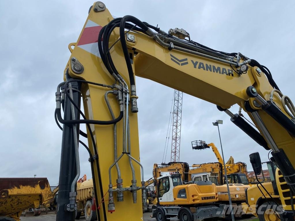 Yanmar B95w . Excavadoras de ruedas