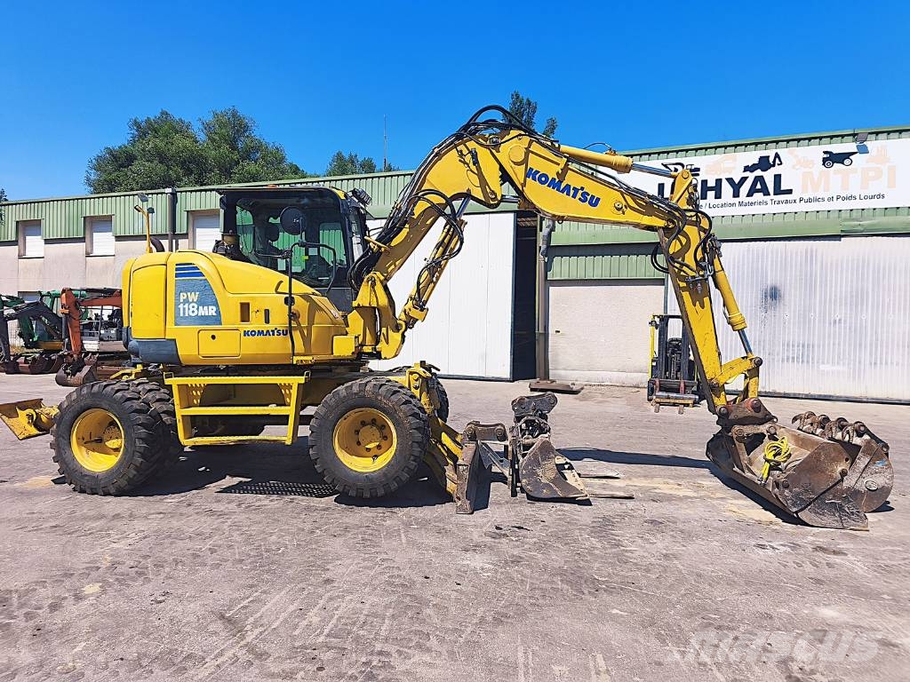 Komatsu PW 118 MR-8 حفارات بعجل