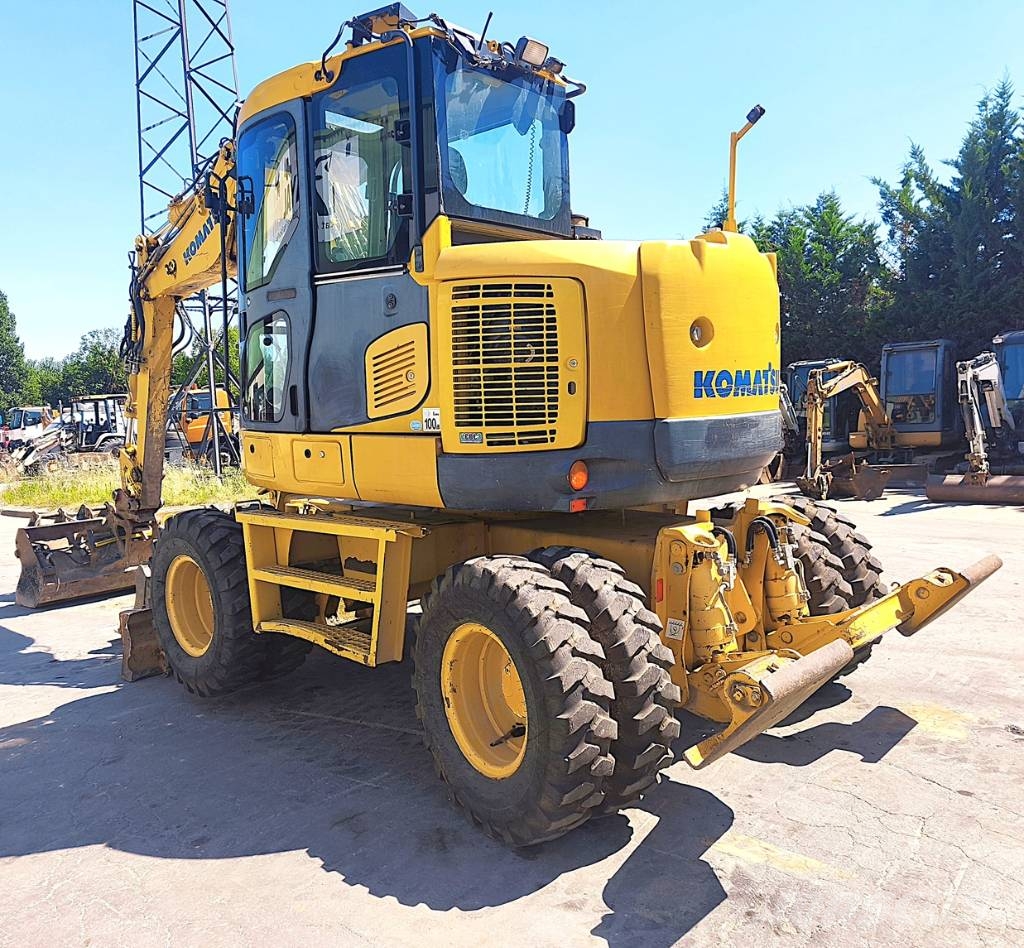 Komatsu PW 118 MR-8 حفارات بعجل