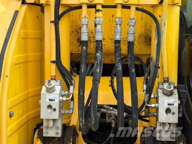New Holland E 140 C SR حفارات زحافة