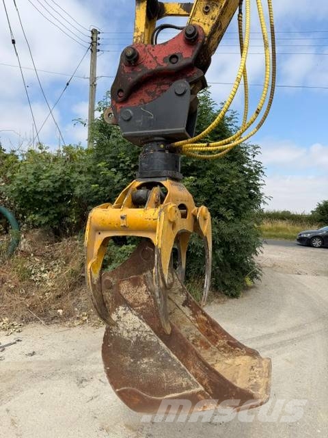 New Holland E 140 C SR حفارات زحافة