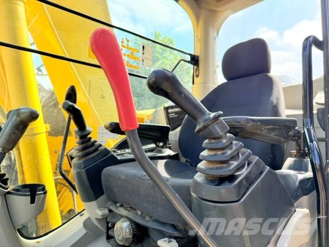 New Holland E 140 C SR حفارات زحافة
