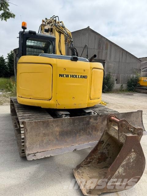 New Holland E 140 C SR حفارات زحافة