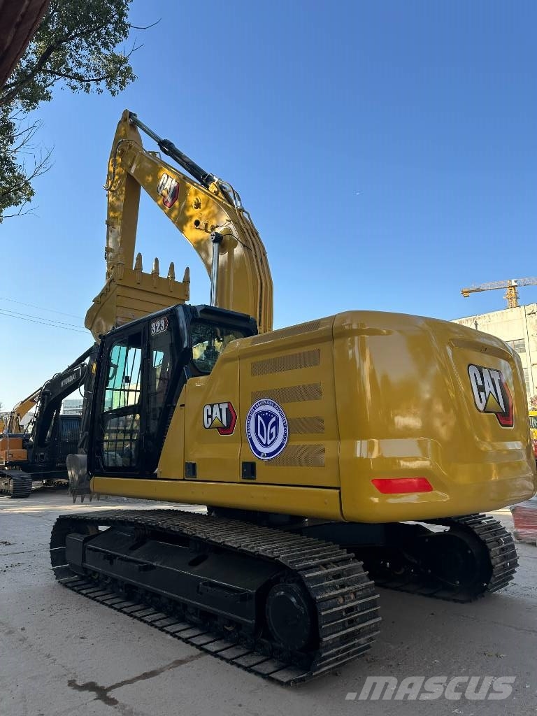 CAT CAT323 حفارات وسط 7 طن - 12 طن