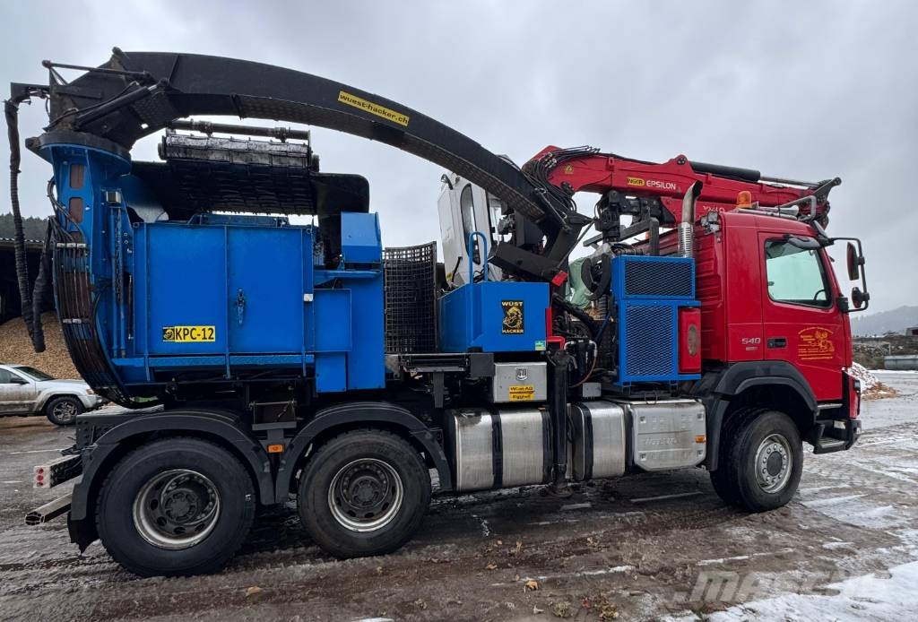 Wüst Hacker auf Volvo FMX 6x6 KPC-12 gebraucht, max. Holzdurchm. 70cm Koksnes šķeldotāji