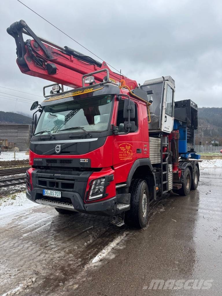 Wüst Hacker auf Volvo FMX 6x6 KPC-12 gebraucht, max. Holzdurchm. 70cm Koksnes šķeldotāji