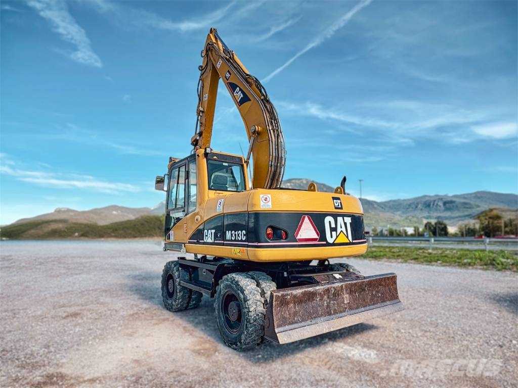 CAT M 313 C Escavatori gommati