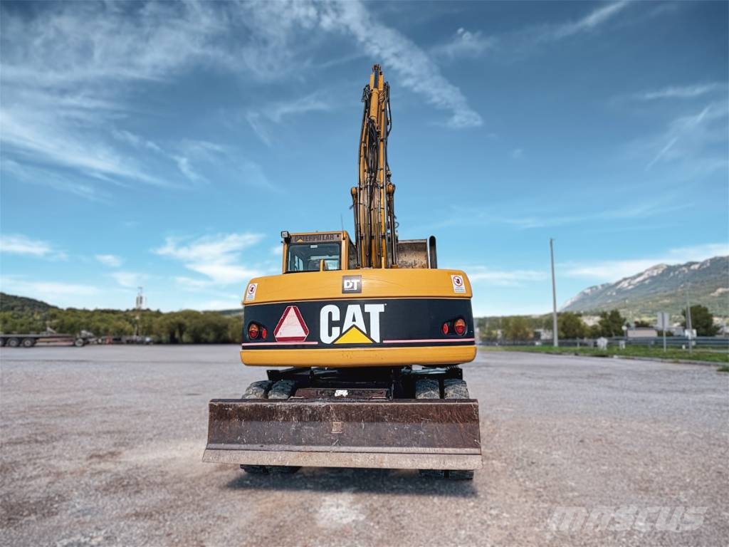 CAT M 313 C Escavatori gommati