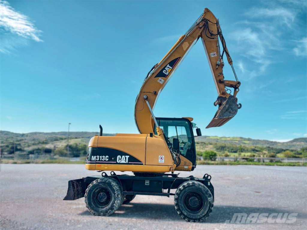 CAT M 313 C Escavatori gommati
