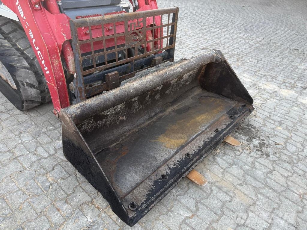 Takeuchi TL10V-2 . Ładowarki burtowe