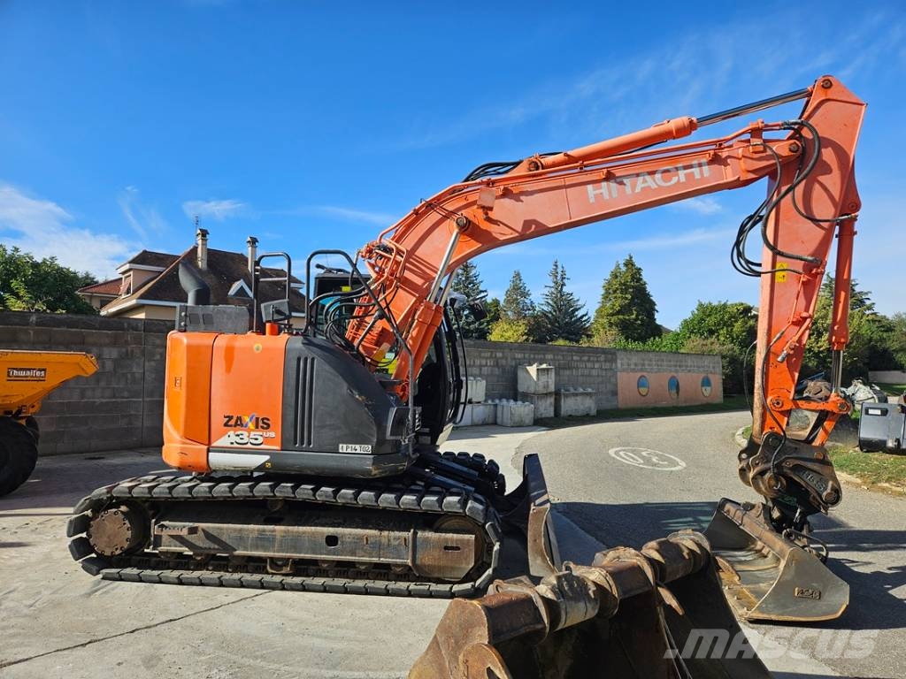 Hitachi ZX 135 US-6 Bandgrävare