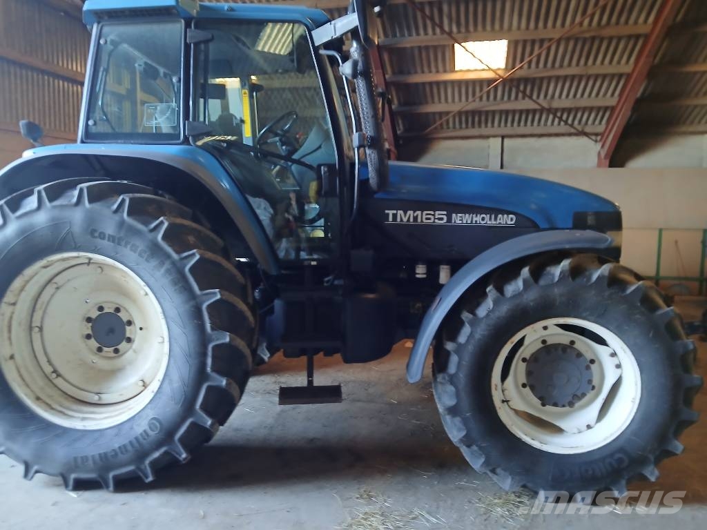 New Holland TM 165 med frontlift Trattori