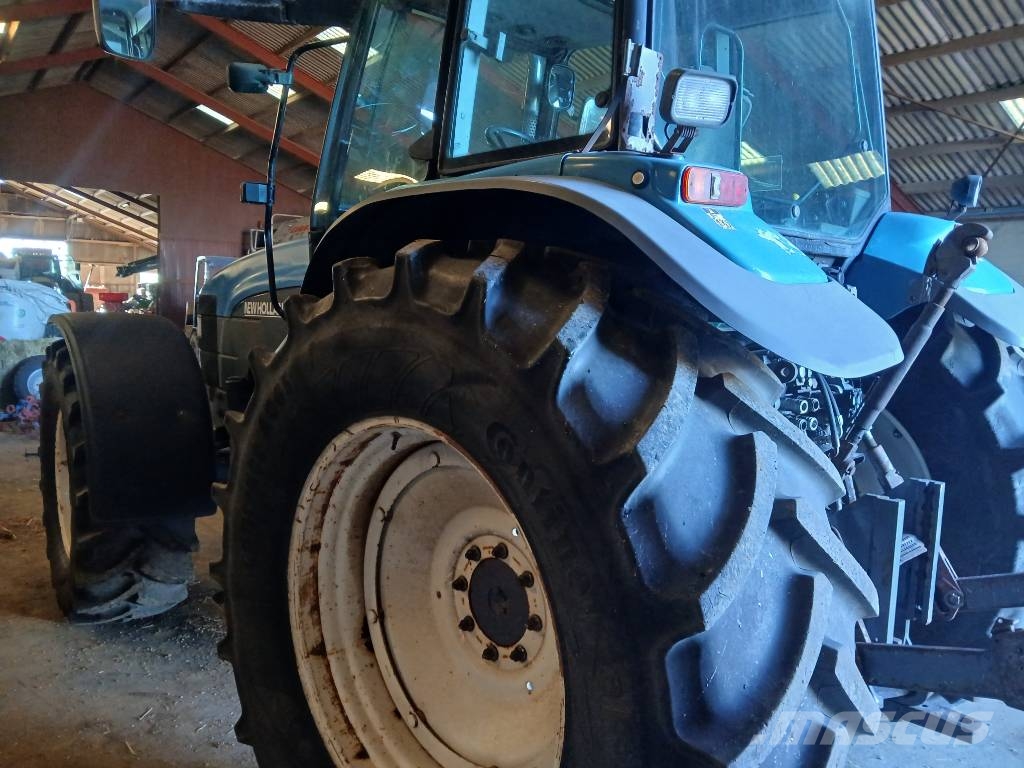 New Holland TM 165 med frontlift Trattori