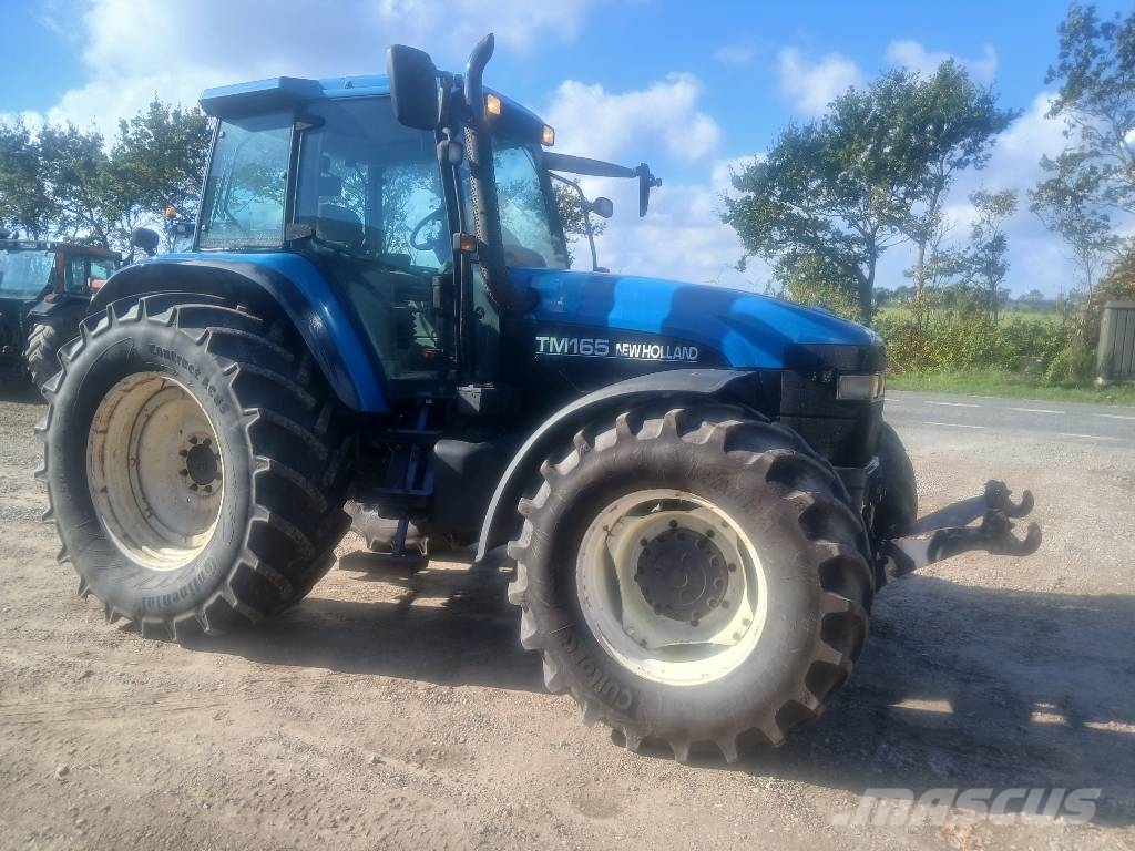 New Holland TM 165 med frontlift Tractoren