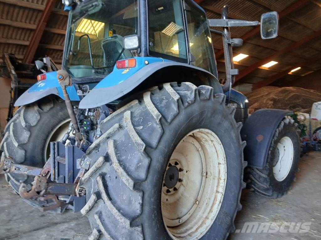New Holland TM 165 med frontlift Trattori