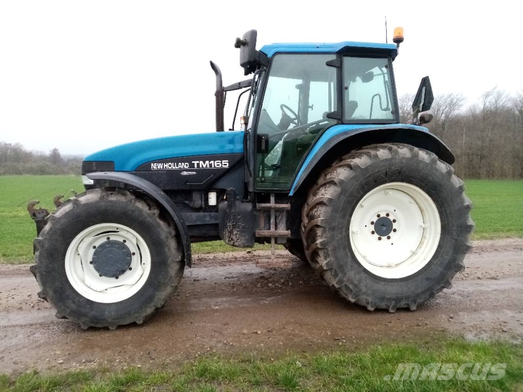 New Holland TM 165 med frontlift Traktoren