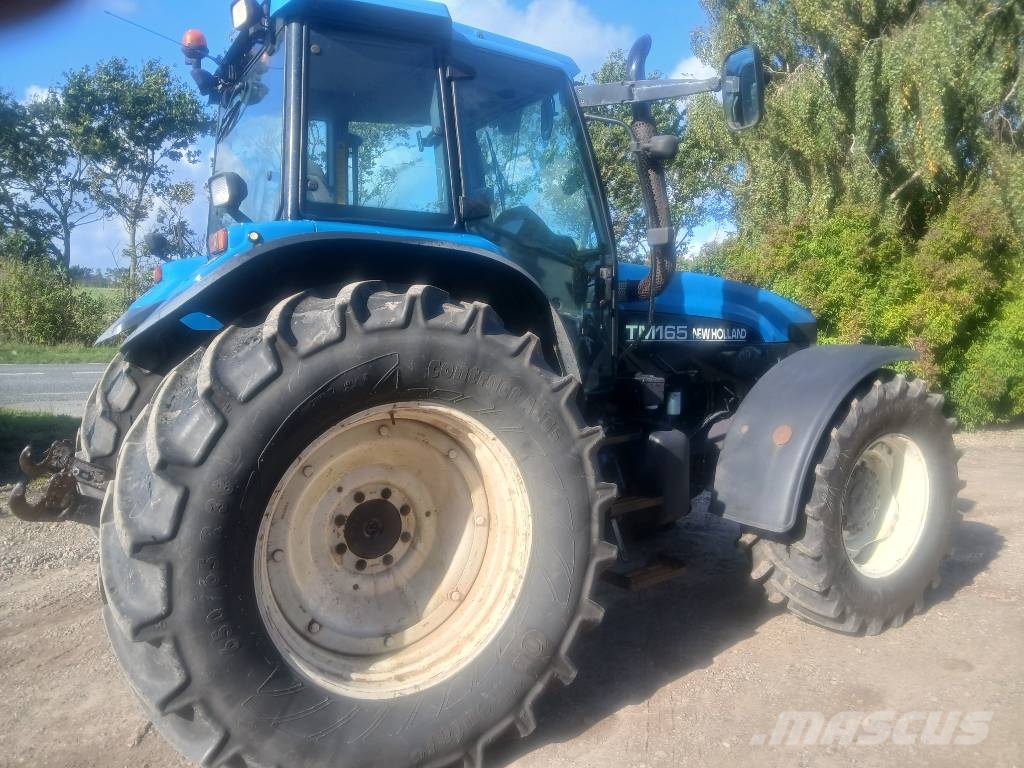 New Holland TM 165 med frontlift Tractoren
