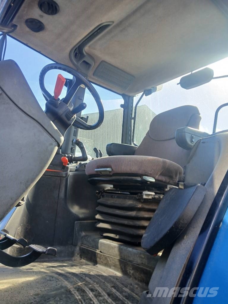 New Holland TM 165 med frontlift Tractoren