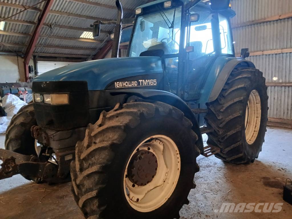 New Holland TM 165 med frontlift Trattori