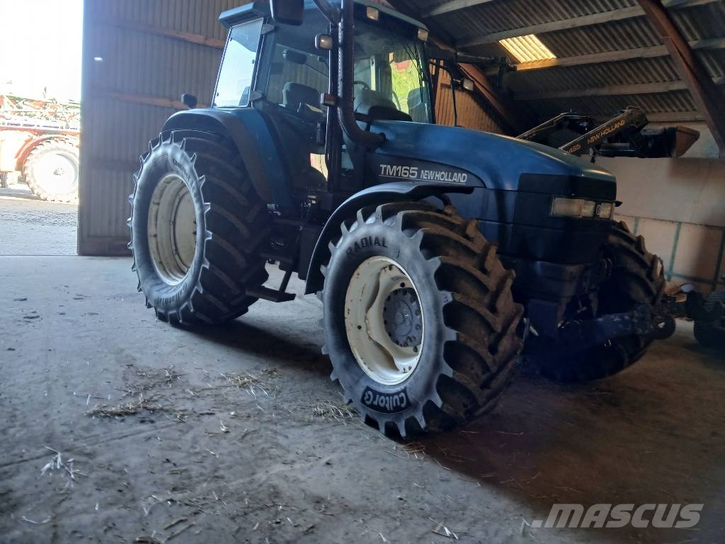 New Holland TM 165 med frontlift Trattori