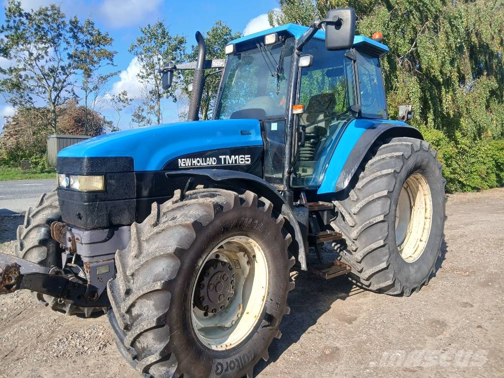 New Holland TM 165 med frontlift Tractoren