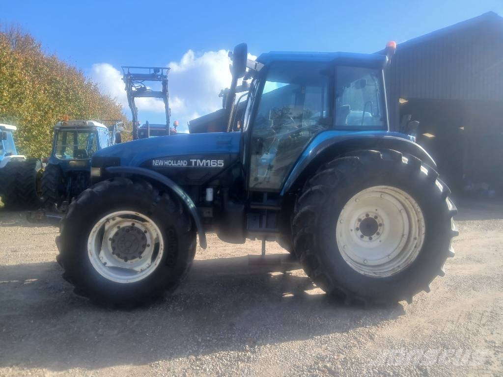 New Holland TM 165 med frontlift Tractoren
