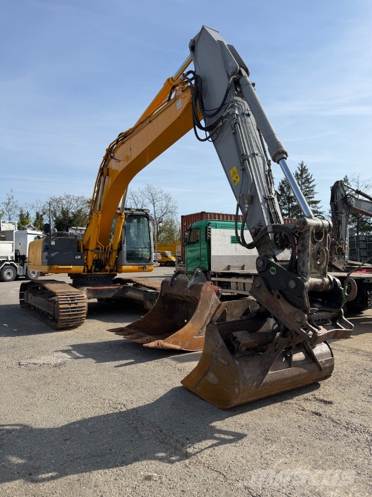 New Holland E 305 C Гусеничні екскаватори