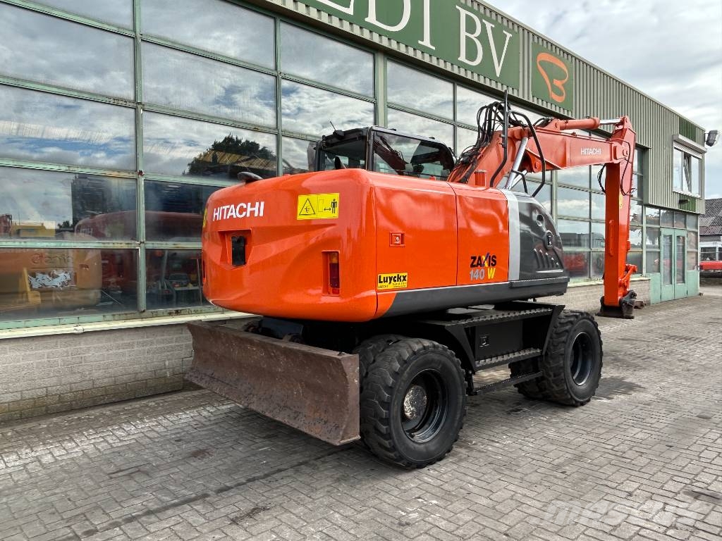 Hitachi ZX 140 W-3 حفارات بعجل