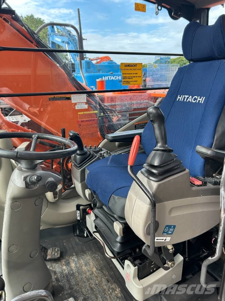 Hitachi ZX 140 W-3 حفارات بعجل