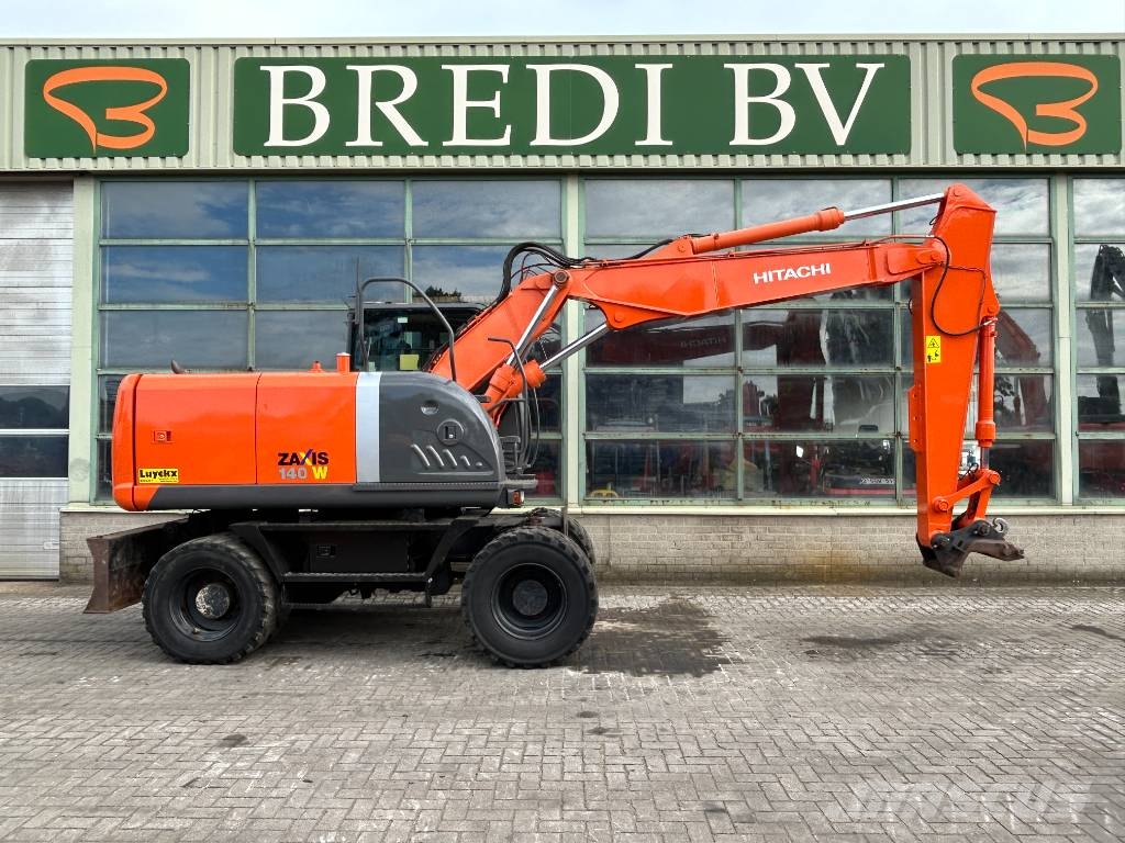 Hitachi ZX 140 W-3 حفارات بعجل